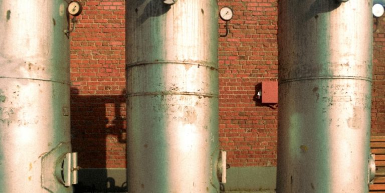 Commercial mechanical room tanks and gauges for hot water systems