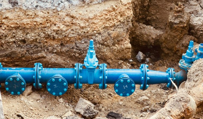 Underground water main pipe prepared for repair or replacement
